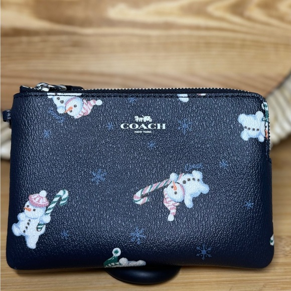 Coach Handbags - Coach Navy Corner Zip Wristlet Snowman Print C7401